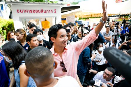 Pita Limjaroenrat candidate prime minister wave to people in a day of general election