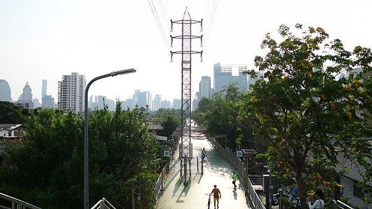 Green Bridge, an overpass that is popular for walking, exercising, cycling, this bridge connects Lumpini Park on Wireless Road and Benjakiti Park on Ratchadapisek Road, Bangkok, thailand.