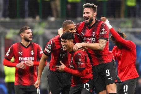 Olivier Giroud (AC Milan) and teammates celebrate the victory and greet the fans in the stands at the end of the soccer game AC Milan vs PSG - Champions League 2023/2024 Group F match day 4 at San Siro Stadium. AC Milan wins 2-1.