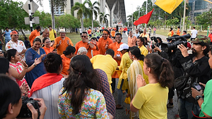 Devotees celebrate before the ceremony float a statue of Ganesha into the Chao Phraya River at Bhumibol Bridge, Rama 3 Road, on the last day of the 16th Shree Ganesha Festival in Bangkok, Thailand, on September 24, 2023.