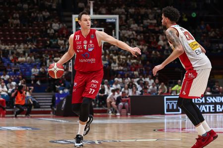 Johannes Voigtmann (Armani center) dribbles in the 4th quarter during basketball game match between EA7 Emporio Armani Milan vs VL Pesaro - Quarter Final game 2 playoff LBA 2022/2023. EA7 Emporio Armani Milan wins 86-57.