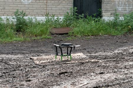 DJI Mavic 3 drone seen on the ground before a member of Special Ukrainian army unit of drones starts reconnaissance of positions of Russian forces using Starlink technology in undisclosed location in Donbas of Ukraine. This unit consists of two groups - pilots, who operate drones from locations close to the front line and operators, who communicate with artillery units on identified targets in order to destroy them.