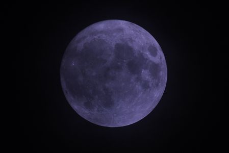 A super blue moon appears in the sky above Kolkata.