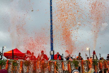 Final day of Viareggio carnival 2023, in Tuscany. Symbolic launch of orange confetti against gender-based violence