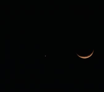 Venus and the Moon Had a Close Call and It Was Spectacular in Srinagar the Summer captial of Indian Administrated Kashmir on April 23, 2023.