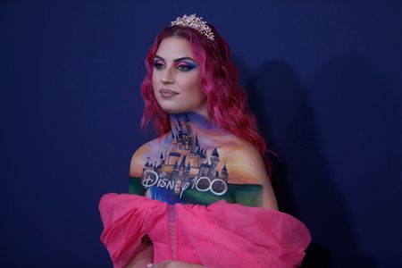 The Spanish artistic makeup artist, Nuria Adraos (Valencia, 2000), who became known for showing her work on social networks in which she transforms her body with designs inspired by fantasy, is seen on Saturday, September 30, 2023, while attending the gala commemorating Disney's 100 years, at the Teatro Real, in Madrid (Spain). This young creator, just 23 years old, has become an 'influencer' on social networks. Instagram, Tik Tok and Twitch are the showcase in which she shows her particular work. She is an expert in 'body painting', a technique that she develops on her own body and that is inspired by fantasy characters from the Disney universe, 'Pirates of the Caribbean', 'Star Wars' or 'Harry Potter'. Disney celebrates its 100 years of history with a concert at the Teatro Real in Madrid with a musical gala under the name 'Disney 100 The Gala'. The great event featured performances by well-known local artists who performed many musical themes from Disney movies. On October 16, 2023 The Walt Disney Company will celebrate 100 years of history. Throughout this year, the company will honor the fans and creators of the stories that have made the excitement and magic of Disney possible over the past century. Disney 100 is a celebration of the timeless stories and unforgettable characters that have entertained and inspired people of all ages these past 100 years.