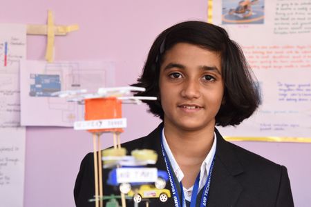 A school student showing her model at the 46th Eastern India Science Fair (EISF) along with 20th Science & Engineering Fair (SEF) that organized by the Birla Industrial & Technological Museum (BITM). Main theme of the fair (January 10-13, 2023) is 'Science and Technology for Sustainable Development'.