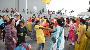 Devotees celebrate before the ceremony float a statue of Ganesha into the Chao Phraya River at Bhumibol Bridge, Rama 3 Road, on the last day of the 16th Shree Ganesha Festival in Bangkok, Thailand, on September 24, 2023.
