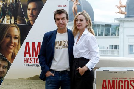 The Spanish actor theater, television and film actor, Javier Veiga (L), known for his work as presenter of the Comedy Club on Canal+ and the Spanish actress, Marta Hazas (R), know for her performance in the series 'El internado' or 'Velvet', are seen on Tuesday, September 12, 2023, while posing for the media during the presentation of the film 'Amigos hasta la muerte' (by its title in Spanish), directorial debut of actor, in Madrid (Spain). 'Amigos hasta la muerte' will be released in theaters on September 22, after its successful run at several festivals. This dramatic comedy of Spanish-Mexican production revolves around the limits of friendship, each person's priorities when life puts you to the test, and how little the things that seemed important before suddenly matter.