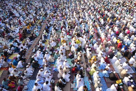 Indian Muslims offer prayers to start the Eid-al-Fitr festival, which marks the end of their Islamic holy month Ramadan at the Jama Masjid in the old quarters of Delhi.