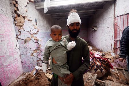 People inspect the damaged room after the roof collapsed in Bhanwari Chongi, initially 5 people were buried under the debris. The rescue teams reached the spot and started the rescue operations, the officials pulled out all the injured from under the debris, in which a 13-year-old boy was killed.