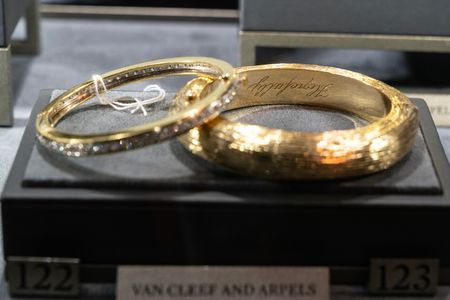Jewels - gold bracelet with word "hopefully" engraved, from The Collection of Mary Tyler Moore, sales to benefit The Mary Tyler Moore Vision Initiative seen during Sotheby's luxury sales press preview at the auction house.