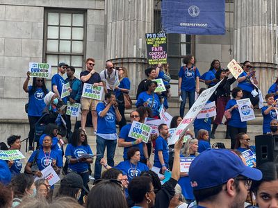 United Federation of Teachers (UFT) members gathered at Brooklyn Borough Hall near NYC Department of Education Headquarters to demand a new contract with the City and fair pay for union members.