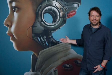 British film director and screenwriter, Gareth Edwards (U.K., 1975), while posing for the media to present his most recent film 'The Creator', in Madrid (Spain). Gareth Edwards is a film director known for 'Rogue One: A Star Wars Story' (2016), 'Godzilla' (2014) and 'Monsters' (2010). With his latest film 'The Creator', the filmmaker launches with an action and science fiction thriller set in a future war between the human race and the forces of artificial intelligence that will premiere in theaters on September 29. In 'The Creator' film Joshua, a hardened former special forces agent grieving over the disappearance of his wife, is recruited to hunt down and kill the Creator, the elusive architect of advanced AI who has developed a mysterious weapon that could put an end to to war... and in the process to humanity. Joshua and his team of elite agents travel through enemy lines to the very dark heart of AI-occupied territory. Once there, he discovers that the world-ending weapon he has been ordered to destroy is an AI that has taken the form of a little girl.