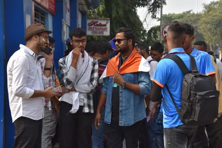 Cheerful spectators entering into the Eden Gardens stadium in Kolkata for England vs Pakistan, ICC Cricket World Cup 2023, one day match.