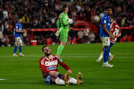 Antonio Puertas of Granada CF regrets a failed opportunity during the Liga match between Granada CF and Getafe CF at Nuevo Los Carmenes Stadium on November 11, 2023 in Granada, Spain.
