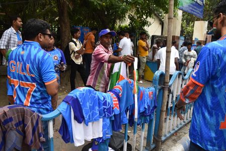 Cheerful spectators entering into the Eden Gardens stadium for India vs South Africa, ICC Cricket World Cup 2023, one day match.