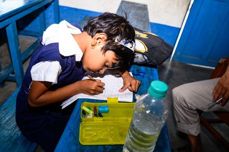 Less than a week after notifying the State Education Policy, 2023, the West Bengal government on Saturday made it public. Where it has continued with the prevailing 5+4+2+2 pattern for school education. At the primary level, the education policy also recommended that 'Bangla' language as a subject may be introduced from Class I to Class XII for students of other mediums of instruction, but not as the first language. The only change suggested in the structure is the inclusion of the first two years of early years of education at Anganwadi Centre. This would be followed by one year of pre-primary at a government or private pre-primary school. Here in India- Bangladesh border side rural school A teacher is trying to explain to his class of pre-primary students (ages between 5 to 6 years) how to write English letters, students are constantly making fun of their teacher, and some are drawing pictures in notebooks at Nabin Nagar, West Bengal, India on 15/09/2023.