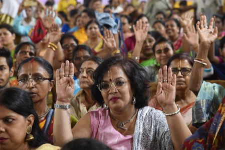 Hindu devotees attend "Snan Yatra" or the holy bathing ceremony of idols of Hindu deities of Jagannath, Balabhadra and Subhadra ahead of Rath Yatra or chariot festival in Kolkata, India, June 4, 2023.