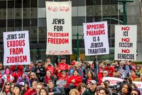 Jewish activists hold a Passover Seder outside ICE Headquarters in New York