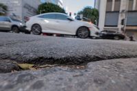 Potholes and broken sidewalks are a blight on the city