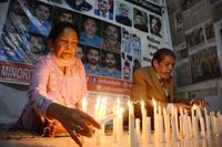 Lighting candles on the occasion of Thanksgiving Day