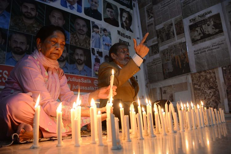 Lighting candles on the occasion of Thanksgiving Day