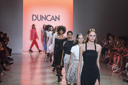 Models walk runway for Michelle Duncan show during New York Fashion Week Spring/Summer 2022 at Spring Studios