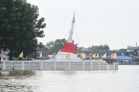 The leaning Mon pagoda rim Chao Phraya River, an important landmark on Koh Kret, Nonthaburi, Thailand, October 21, 2021.