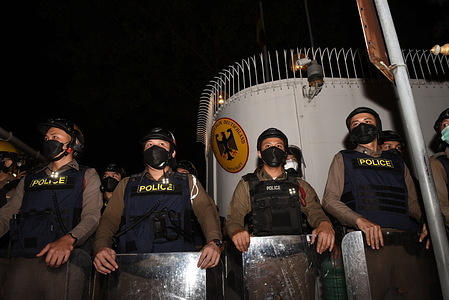 Police with riot gear Line up at the front Embassy of Germany in Thailand, South Sathorn Road for security During the protests against the absolute monarchy Traveled to submit a statement to the German Ambassador to Thailand on November 14, 2021.