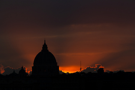 View of sunset near St. Peter's Dome from Pincio terrace in Rome