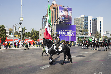 Parade organized by the Mexican government in commemoration of the 111th anniversary of the Mexican revolution.Military, actors disguised as historical figures, horseman and horsewoman participated.
