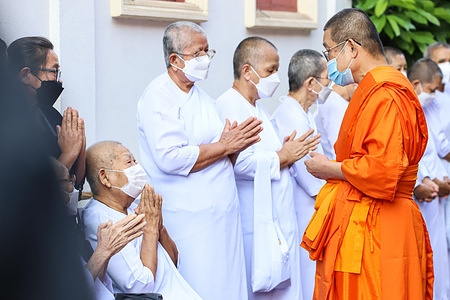 Buddhist monks and people farewell the passing of the Revered monk Somdet Phra Maha Ratchamangalacharn, aka Somdet Chuang, abbot of Wat Paknam Phasi Charoen, a former operative on behalf of the Supreme Patriarch of Thailand. at Wat Paknam Phasi Charoen.
