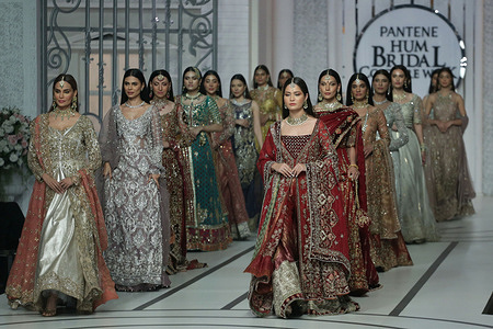 Pakistani model presents a creation by a brand Zonia Anwar,Reema Ahsan, Nisa Hussain, Nickie Nina, Sabir V. during Pantene Hum Bridal Couture Week at local hotel in Lahore. Twenty-eight designers and retail brands showcasing their latest bridal collections in the three-day event.