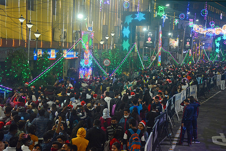 Christmas celebration during pandemic. Amid rising COVID cases and the Omicron threat, a massive crowd of visitors was seen at the Christmas Festival. Most of the people didn't wear masks.