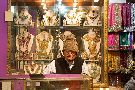 A Jewelry seller waiting for customer in a street ofVaranasi