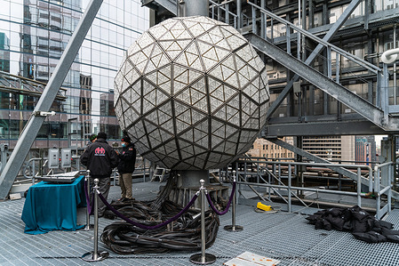 The installation of 192 Waterford Crystal Triangles on the Times Square New Years Ball atop of One Times Square Building.