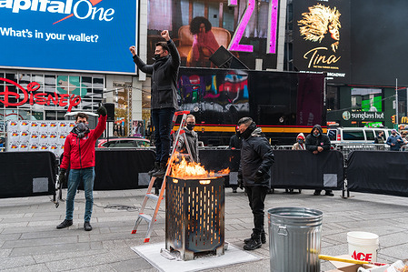 Times Square host the annual Good Riddance Day, where revelers bid a good riddance to the bad memories of 2021 by writing them down on paper and dropping them into an incinerator.