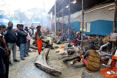 Naga Sadhu (Hindu holy man) at a transit camp for the upcoming auspicious Hindu religious festival Gangasagar Mela, in Kolkata on January 5,2022.