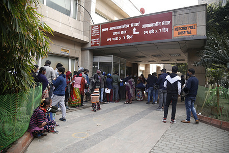 People lined-up for Covid-19 test at a government hospital in Noida after the outbreak of omicron.