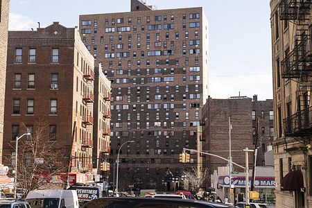 View of the devastated building and apartments where deadly fire caused by malfunctioned space heater claimed 17 lives including 8 children in the Bronx. Fire started in the bedroom of the 3rd floor apartment and when residents left their place with the door opened, smoke quickly spread all away to the 15th floor resulting in injuries and death. That apartment door wasn't functioning properly and did not close automatically after residents from the apartment where the fire started escaped. Many were injured and are being treated in local hospitals. All residents of the building were evacuated and received help from the Red Cross. Number of dead were revised after confusion of where those bodies were taken from the building, however that number could get higher since some people are intubated.