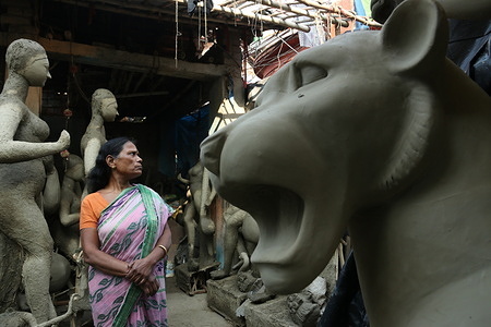Theidols of Saraswati, Hindu goddess of knowledge being made at Kumortuli, the potter's place in Kolkata.