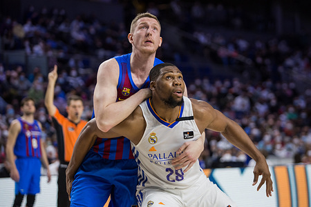 Rolands Smits (L) and Guerschon Yabusele (R) during FC Barcelona victory over Real Madrid 75 -85 in Liga Endesa regular season (day 16) in Madrid (Spain) at Wizink Center.