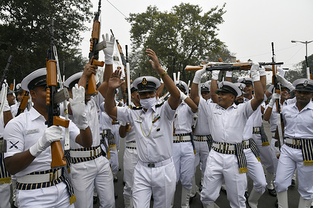 Indian Navy soldiers dancing during the full dress rehearsal for the upcoming Republic Day parade in Kolkata, India
