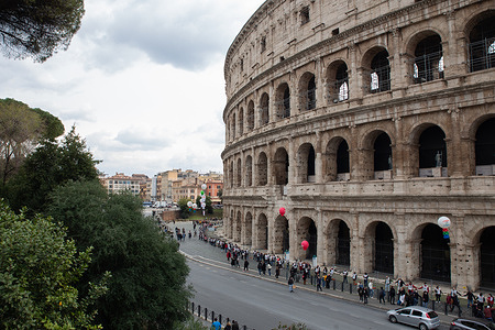 Flashmob around Colosseum in Rome organized by Italian tourism workers