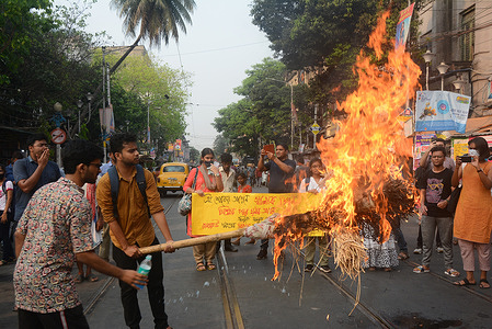 Students activists burning effigy of Chief Minister of West Bengal Mamata Banerjee and protest against Rampurhat incident where eight people including two children were charred to death by fire.
At least 22 people have been arrested so far in connection with violence in West Bengal’s Birbhum district that claimed eight lives, a senior police officer said on Wednesday.