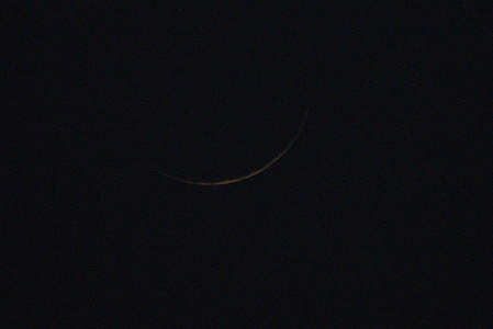 An attractive stunning view of the thin moon of the first Ramadan-ul-Mubarak on sky spreads blessing on the people in Lahore