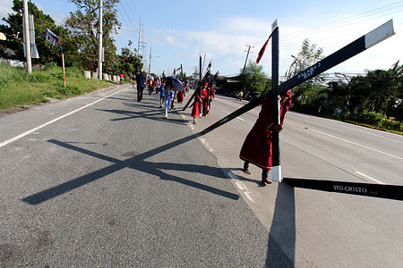 Devotees doing their act of penance during the celebration of Good Friday in Mabalakat, Pampanga (Northern province of Manila). Flagellants hold their traditions for two years as Covid-19 heat the world and Philippine government restricted a social gatherings.