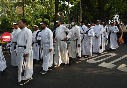 Christians march during Easter Sunday in Kolkata.