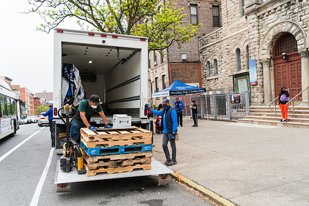 Catholic Charities of the Archdiocese of New York distributed 200 boxes of dry goods and dairy produce to local families in need at St. Luke's Church in the Bronx. This event is a series of pop-up food pantries to address the food insecurities due to the Covid-19 pandemic. Since the start of the pandemic Catholic Charities of New York has distributed nearly 11 millions meals to individuals and families in need.